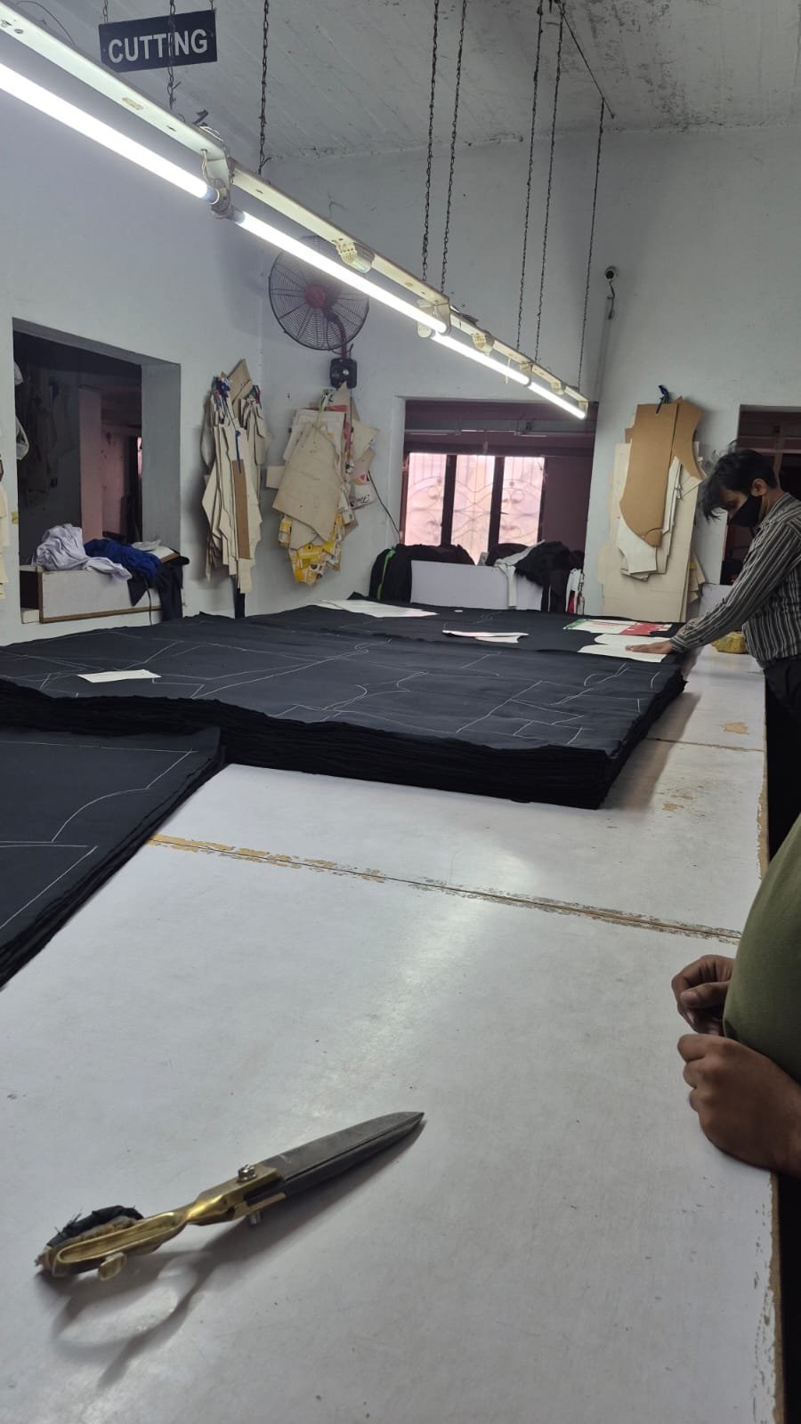 Cutting table and fabric panels